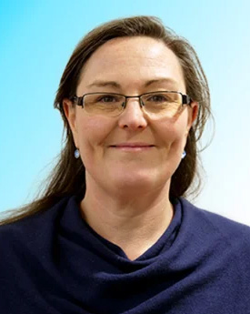 A portrait photograph of Dr Paz Munoz