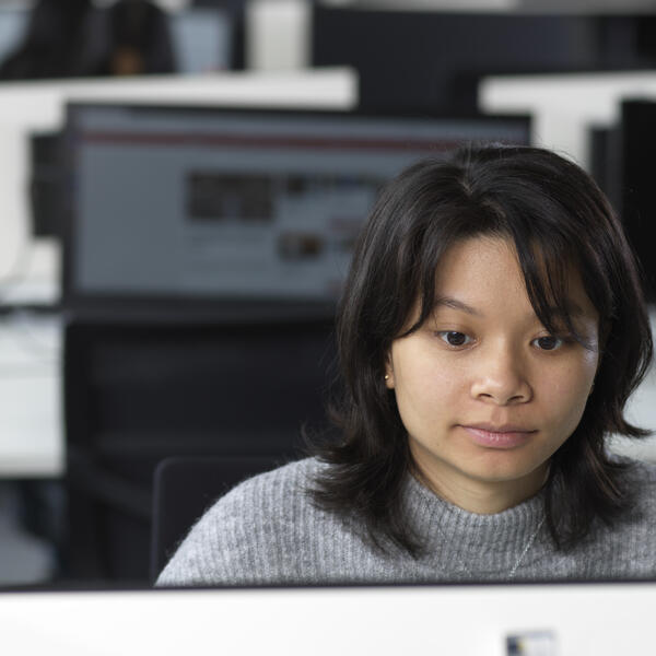 A student sits in the SCC computer labs