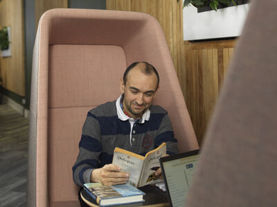 PG student reading a book