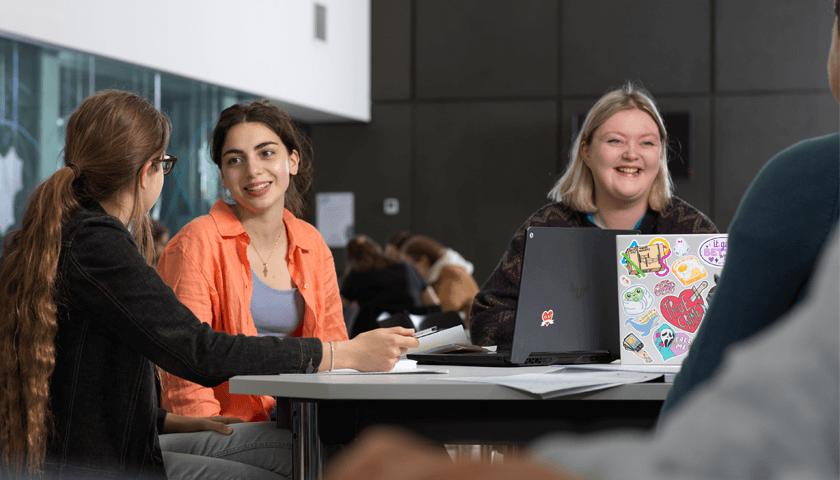 Students working together in the Physics Atrium