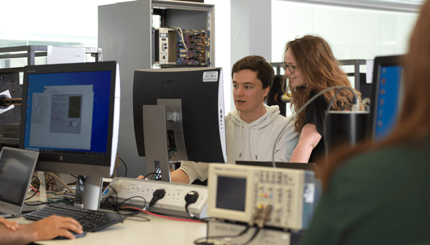 Students working in the Particle physics lab