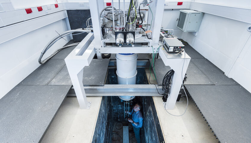 An academic working on the Isolab fridge
