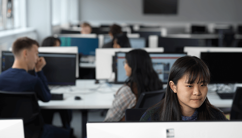 A student sat in one of the new SCC labs working on a computer