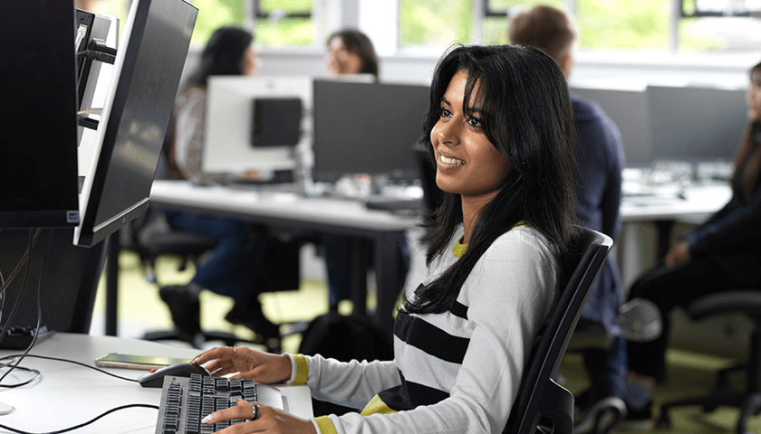 A student sat in one of the teaching labs