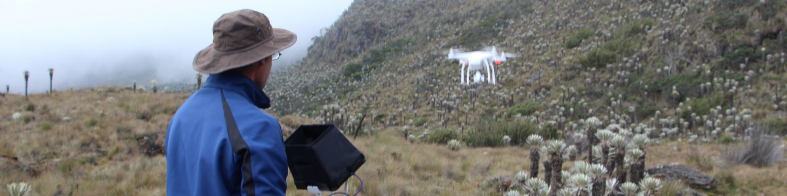 A man piloting a drone