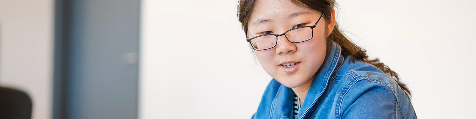 A Maths student at work in the Postgraduate Statistics Centre