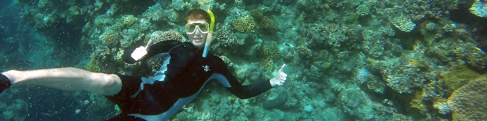 A student snorkeling in Australia