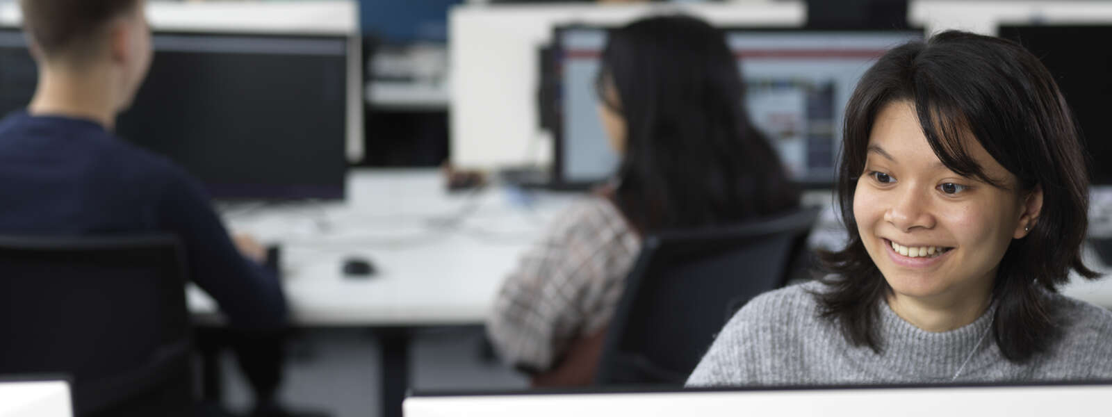 A computing student sat working in the SCC labs