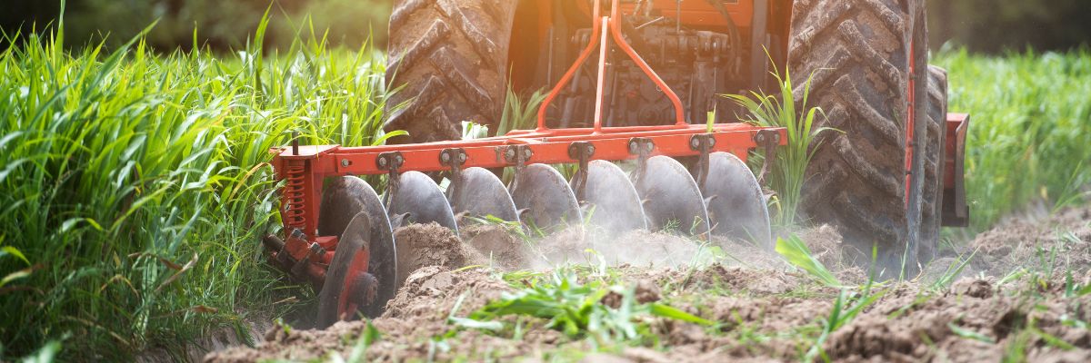 A farmer ploughing a field