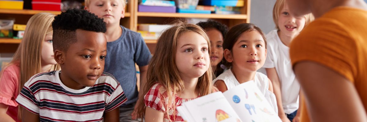 Children listening to their teacher read