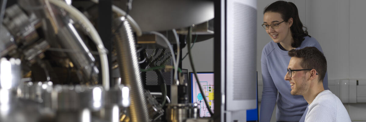 Students operating an X-ray photoelectron spectrometer