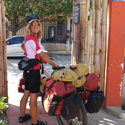 Kate Rawles with her bike packed with many bags