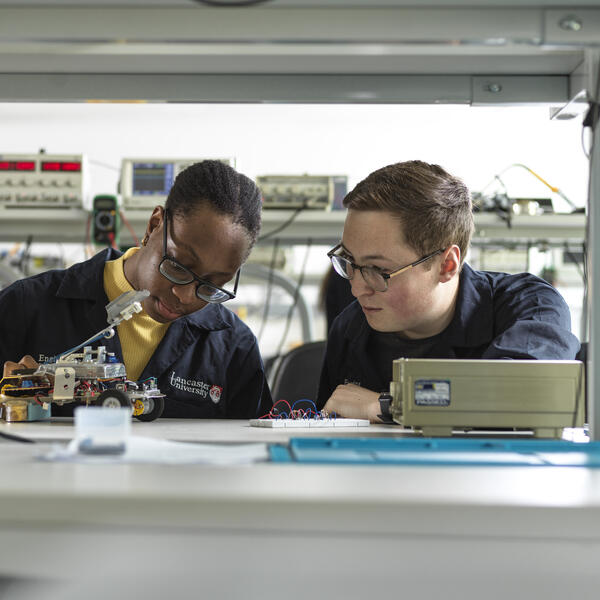 Two students working in the electrical engineering lab