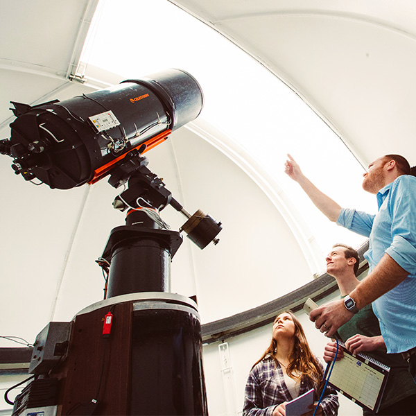 Students use the telescope
