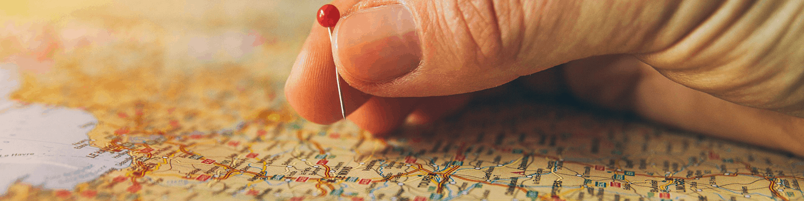 pin being placed into a map