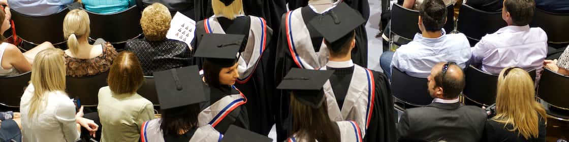 Image of graduates processing at a commencement ceremony
