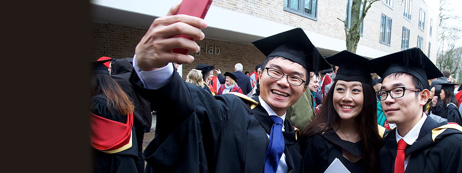 Graduatriong students taking a selfie