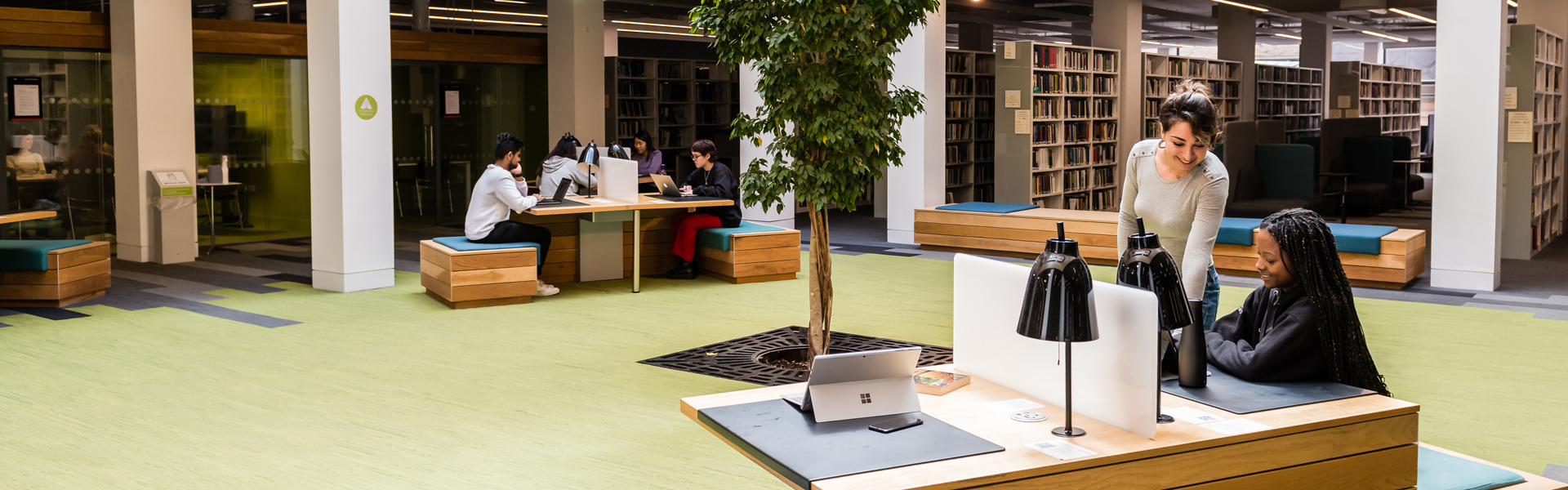 Groups of students working together in the Lancaster University library