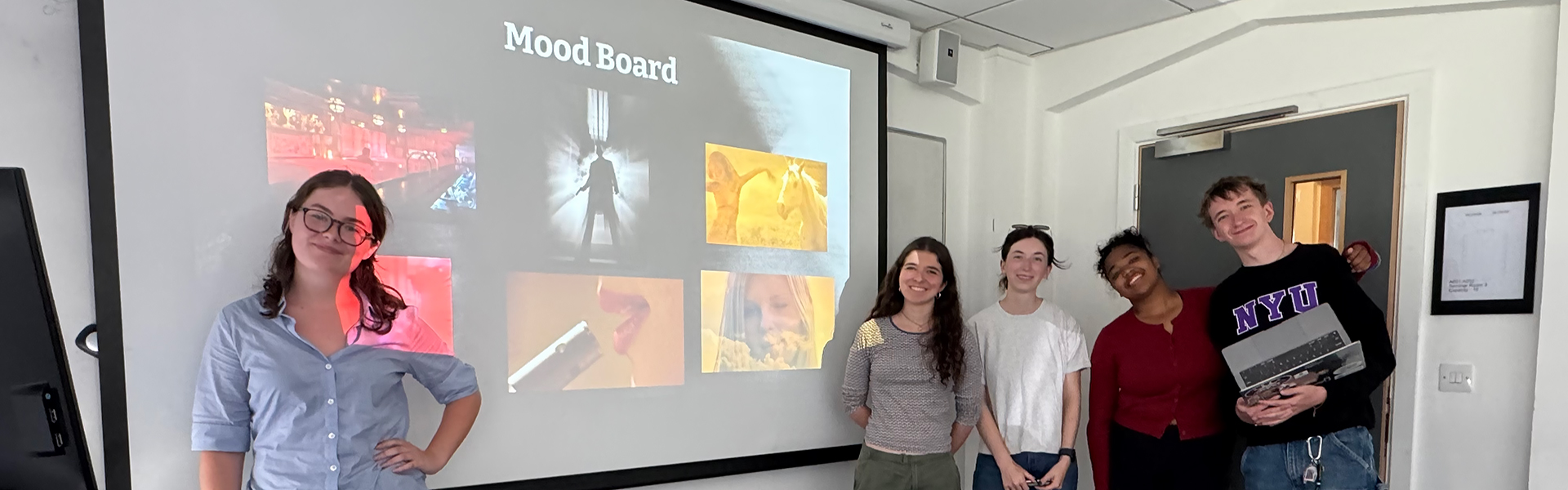 Five students students presenting their project mood board during the Film Summer School