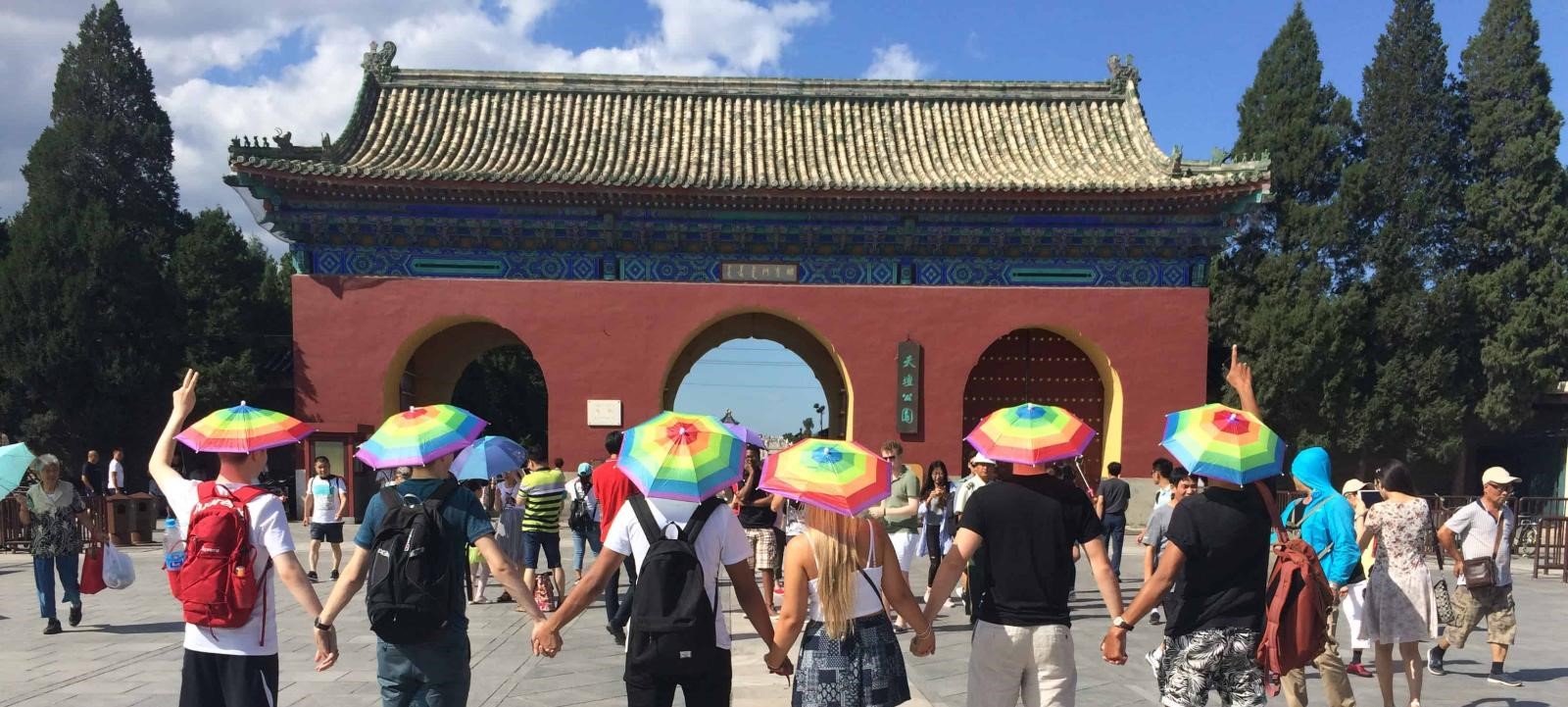 Students in China wearing umbrella hats