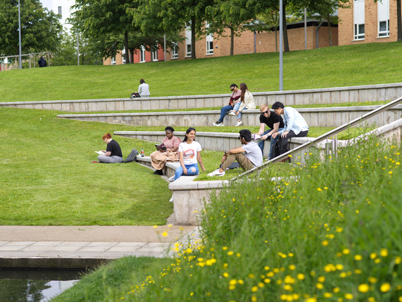 Lancaster students sitting on Bonington steps