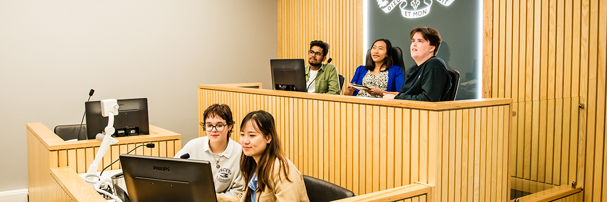 Group of students in the mock courtroom at Lancaster University