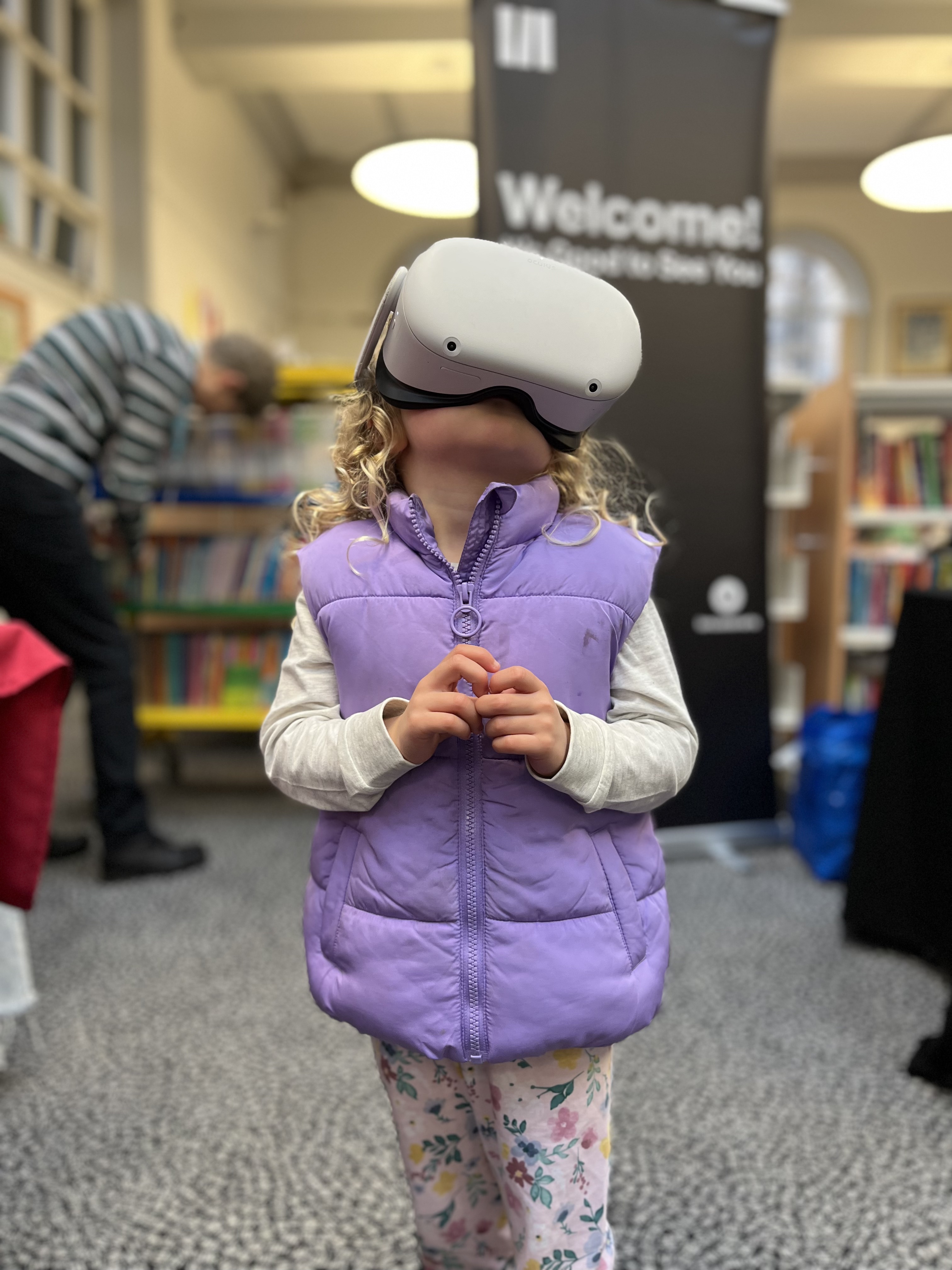 A young boy using a Cyanometer to measure the colour of the sky with AR.