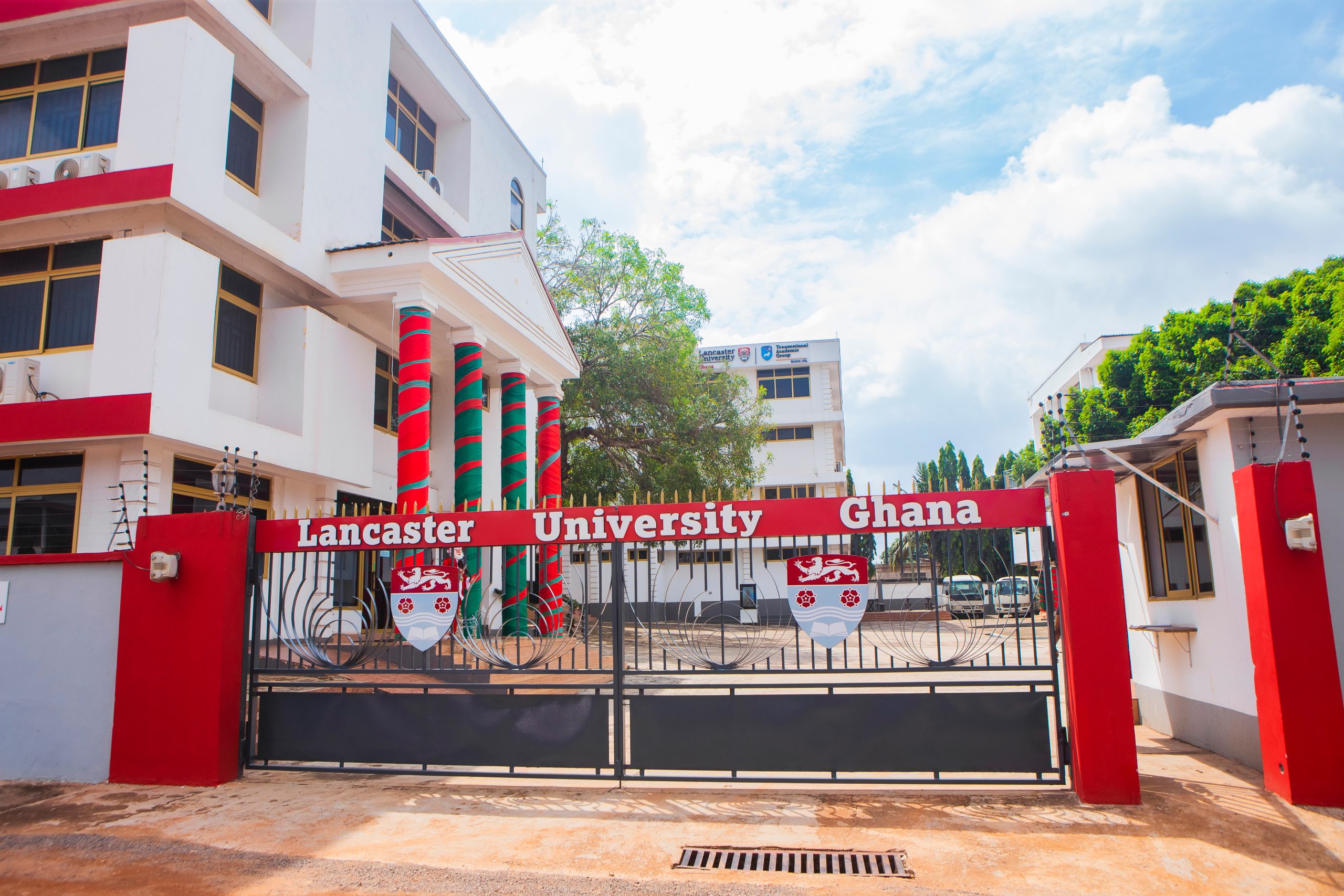 Two people walking on campus