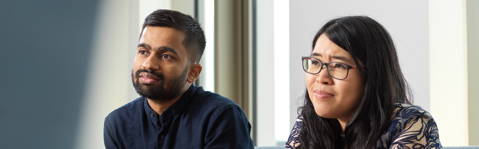 Two students sat at a desk