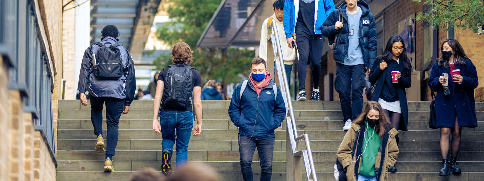 students walking up the spine stairs 