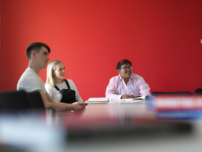 Students sat in the Management School