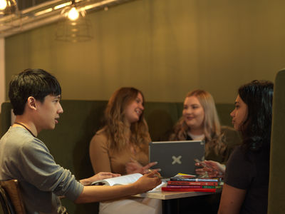 Students studying in a cafe