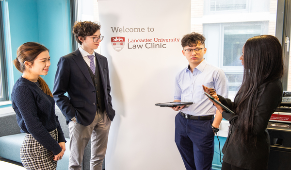 Students having conversation at the Law Clinic