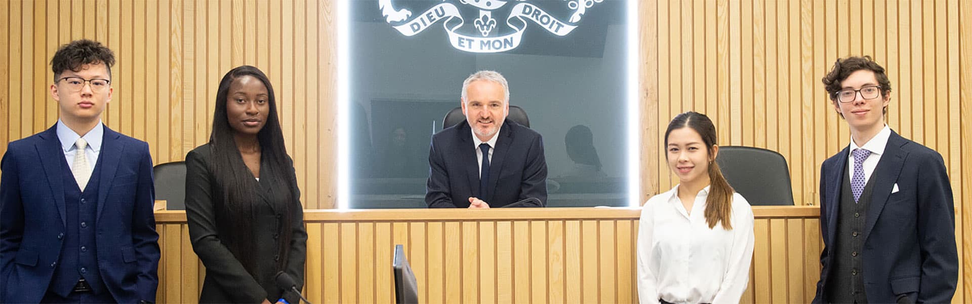 Students and a lecturer at the Law School's Court room