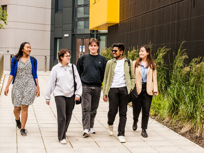 Students walking in front of margret fell lecture theatre