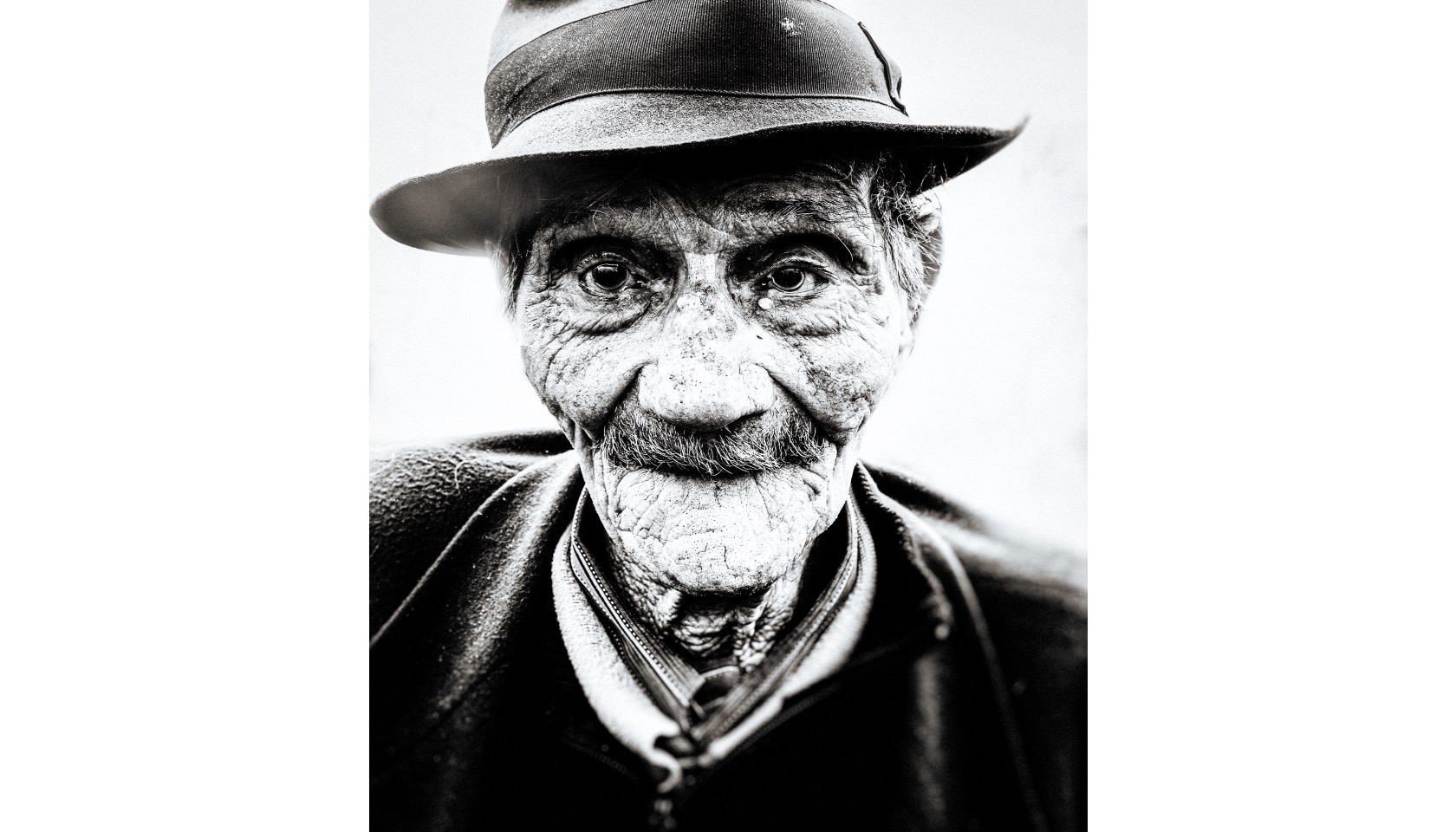 A man in a hat.