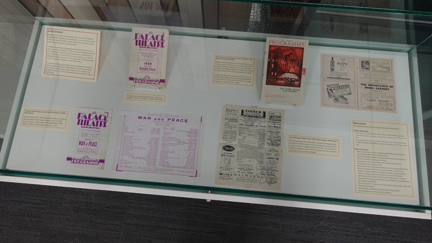 Contents of exhibition cabinet showing publications related to entertainment in World War II.
