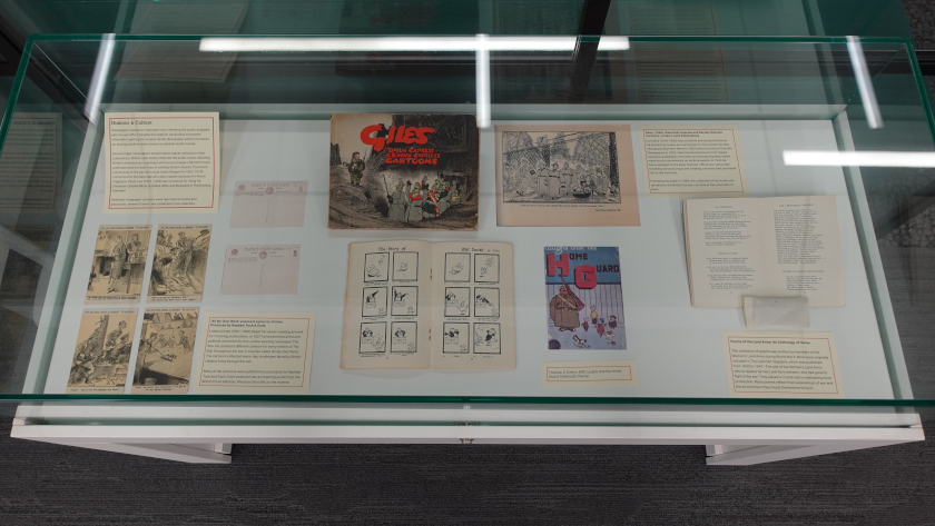 Contents of exhibition showing publications related to humour in World War II.