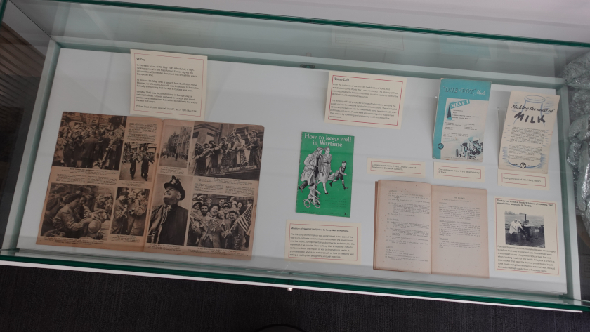 Cabinet showing publications related to food produced in World War II.