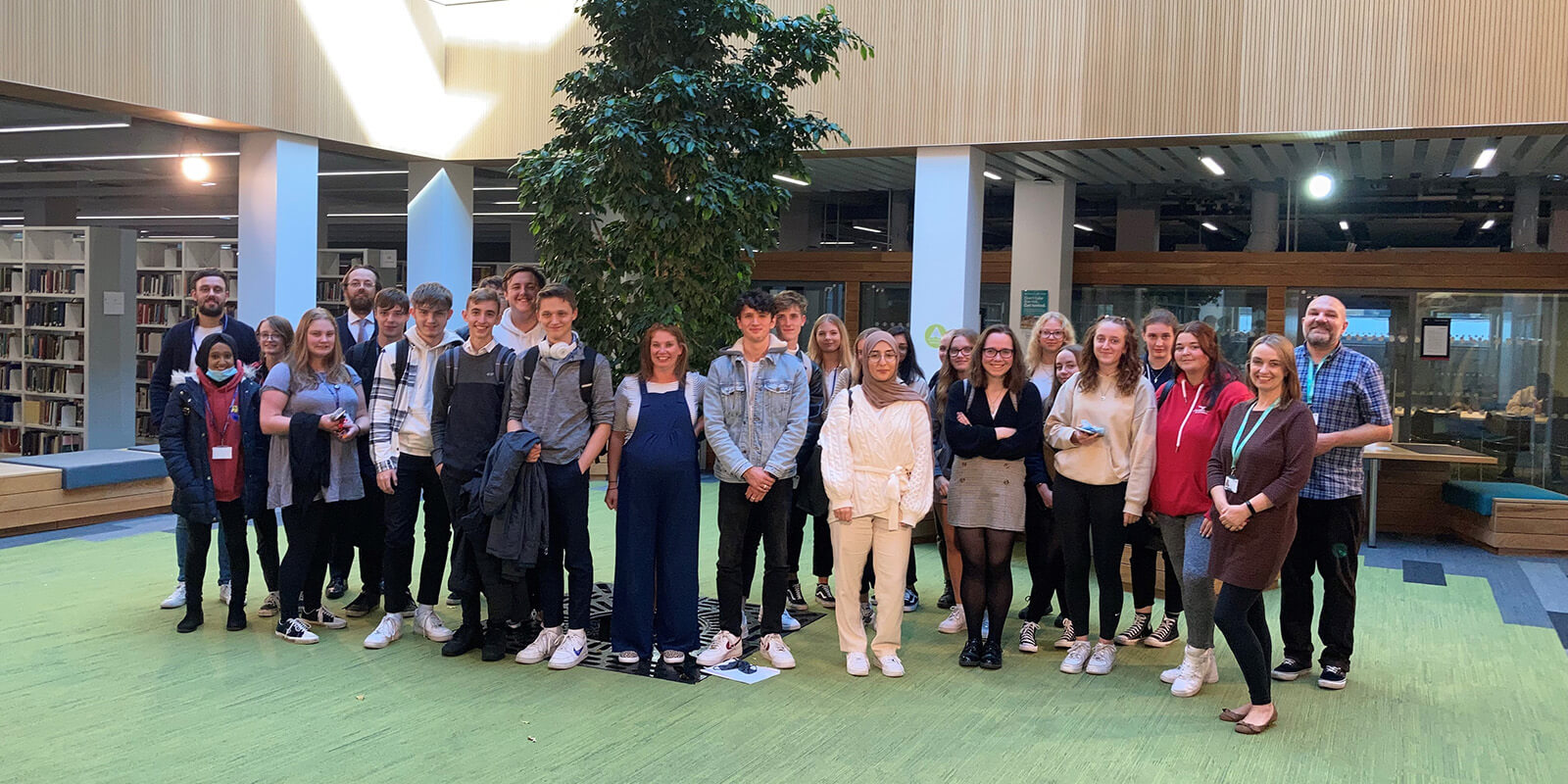 Students from Haslingden School gathered under the library tree