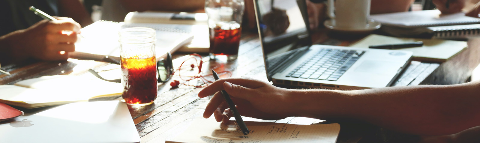 People working at a desk.