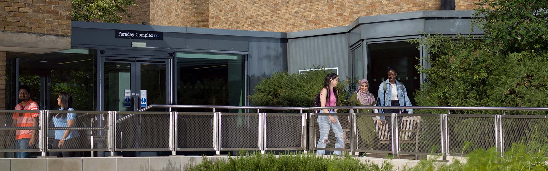 Group of students walking on campus