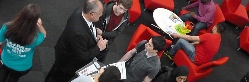 Students talking to company representatives