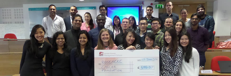 MBA students with their cheque