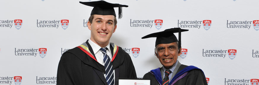 Prize winner, Edward Cox, with Professor Balasubramanyam at graduation