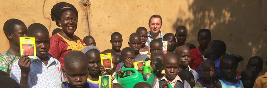 Ian with some of the children AIDS Orphan has helped