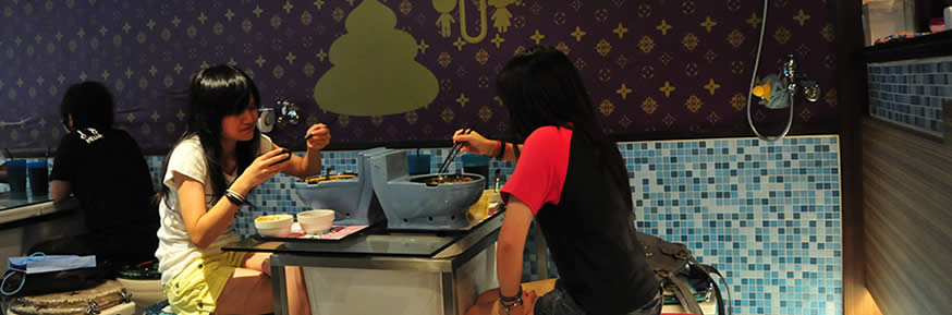 Diners at the Modern Toilet restaurant in Taiwan.