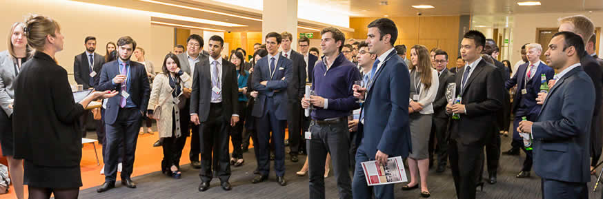 Attendees listening to a speech at the event.