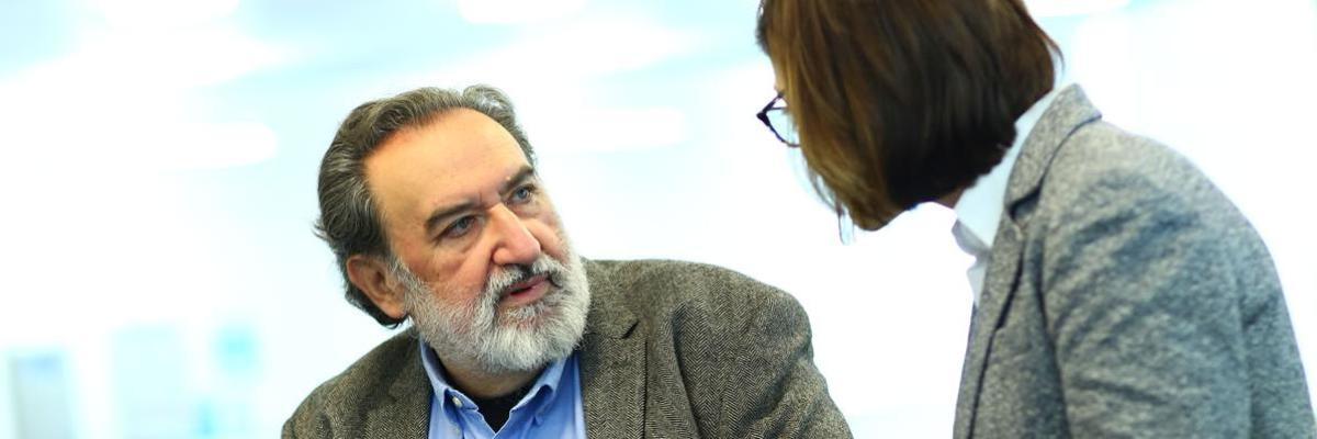 Two people talking