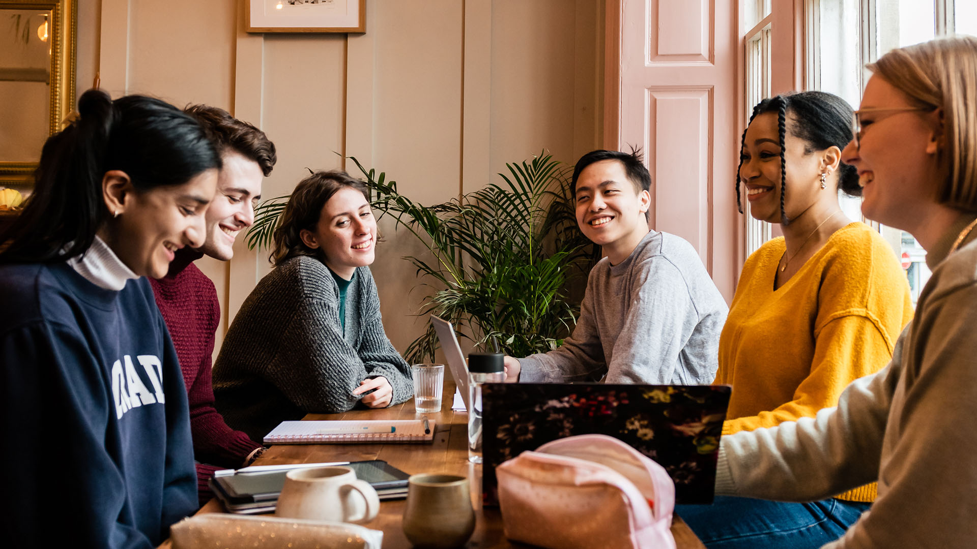 Group of students sitting in a hotel bar